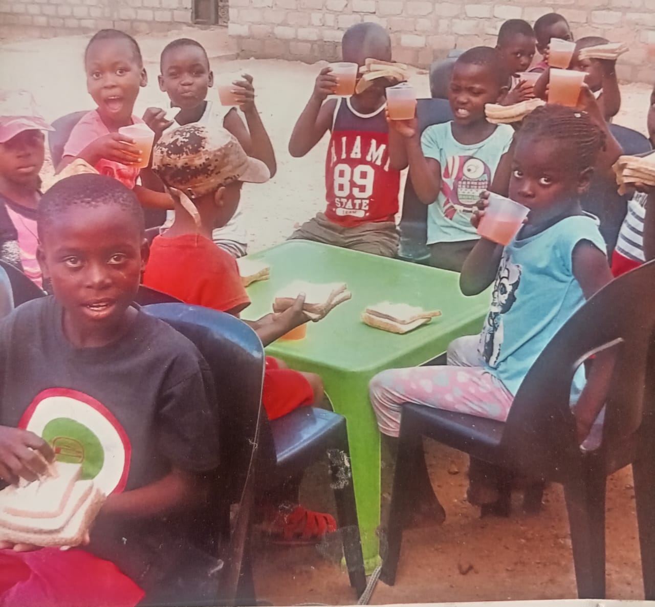Children enjoying nutritious meals provided by NOMAGOM
